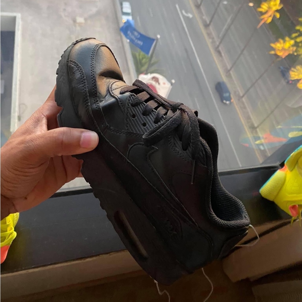 One bent out of Nike shape shoe